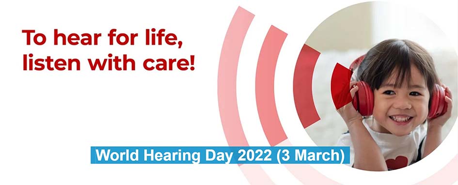 WHO:n Maailman kuulopäivän kuvassa lapsi kuuntelee kuulokkeilla